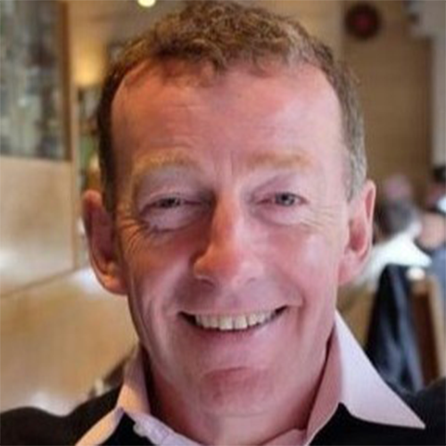 An Image of Advisory Panel Member, Phil. A headshot of a male smiling into the camera.